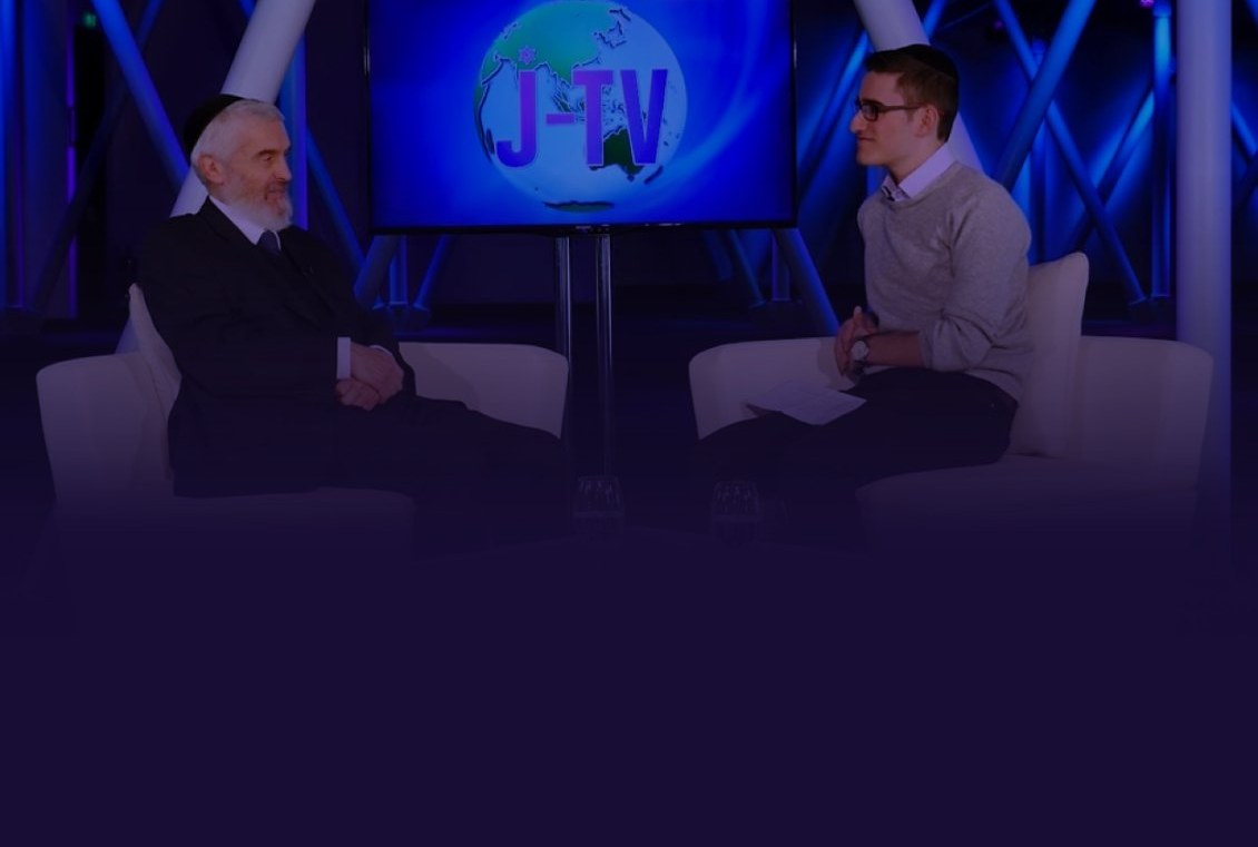 Ollie interviewing a rabbi in the J-TV studio